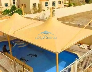 فني تركيب مظلات مسابح الرياض