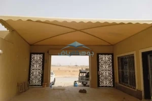 فني تركيب مظلات حي الرمال
